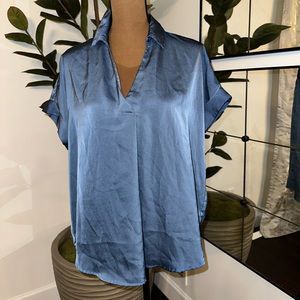 Silk oversized blue top with buttons down the center back